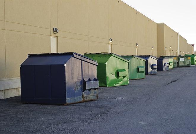 commercial disposal bins at a construction site in Bairdford